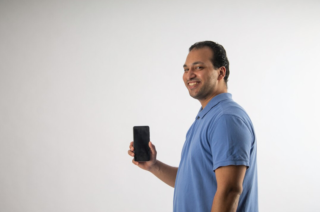 happy user with mobile device
