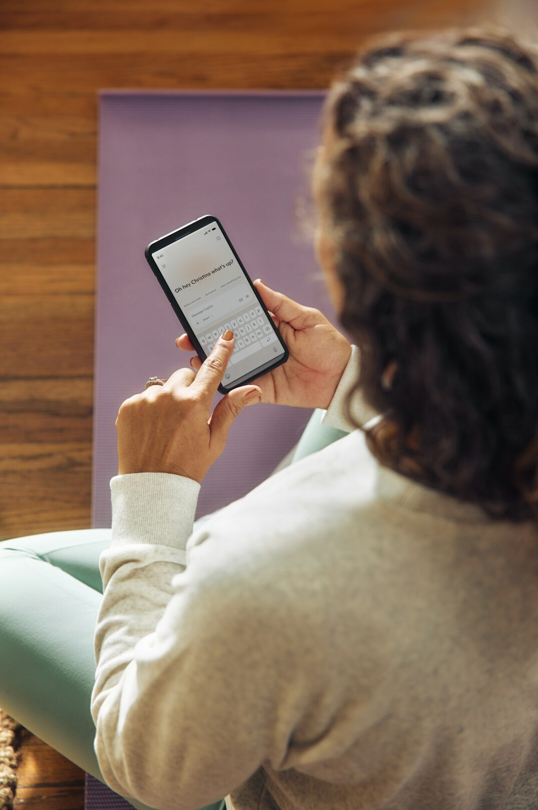 woman meditating with app