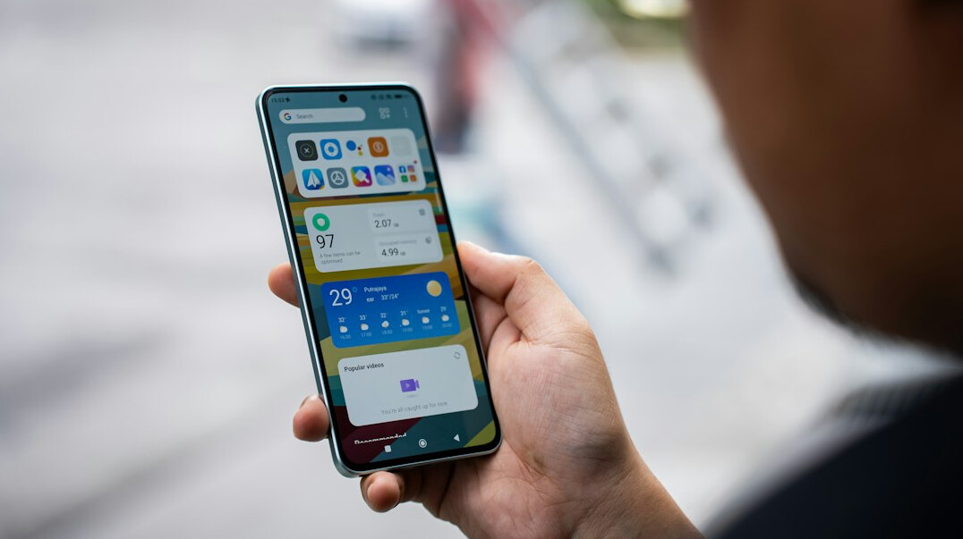 person using productivity app on phone